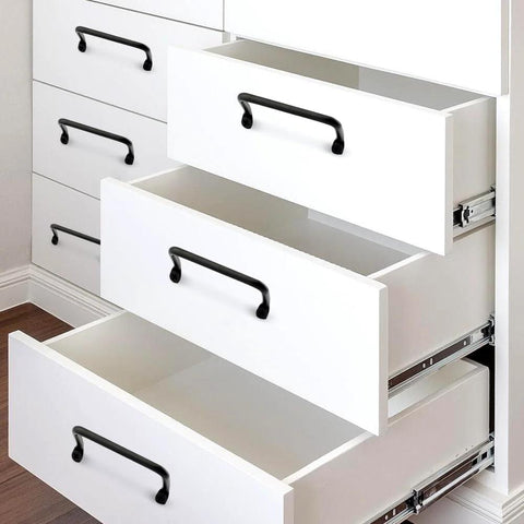 Matte Black 4 Inch Cabinet Pulls 4 Pack With Screws Modern Iron Drawer Handles on white drawers in a kitchen setting