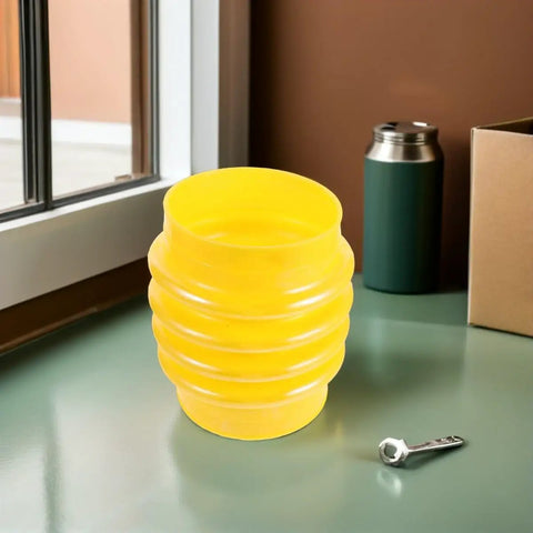 Yellow Beefed Up Heavy Duty Rubber Bellows Boot Dust Cover For Gasoline Tamping Machines on a table near a window