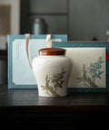 Slick Ceramic Storage Jar With Tight Seamless Lid For Loose Leaf Tea Coffee Beans Sugar Bulk Grains, showcased with gift packaging.
