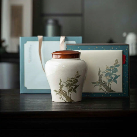 Top Tier Ceramic Loose Tea Storage Jar With Secure Lid Perfect For Keeping Coffee Beans Spices Nuts And Candy Legit Fresh on a kitchen counter.