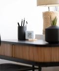 Portable Home Radon Detector With 10 Minute Readings on a modern desk, showing E Ink display with environmental data.
