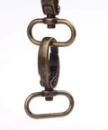 Dead Nuts Sturdy Curved Zinc Alloy Swivel Trigger Clasps For One Inch Webbing Bag Hardware Pack Of Twenty close-up of antique brass swivel clasp