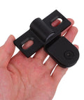 Black Go To Heavy Duty Glass Shower Door Pivot Hinge in Stainless Steel held in hand demonstrating size