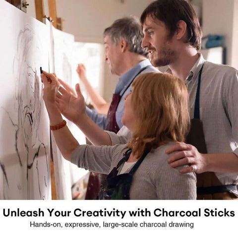 Three people sketching on large canvases using Compressed Graphite And Charcoal Sticks Set Of 18 For Drawing And Sketching.