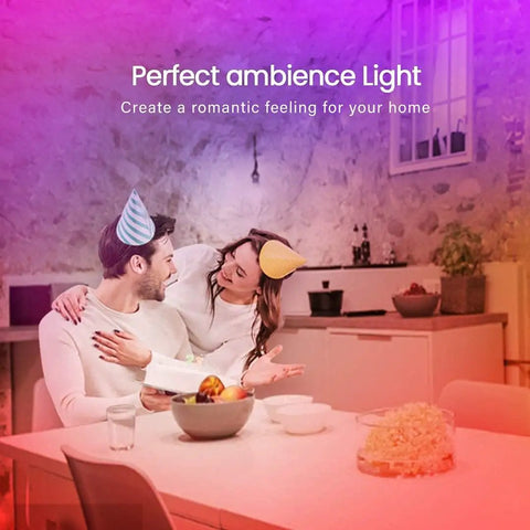 Couple enjoying ambient lighting from Ultra Bright 100 Ft RGB LED Light Strip With Bluetooth App Control in dining room.