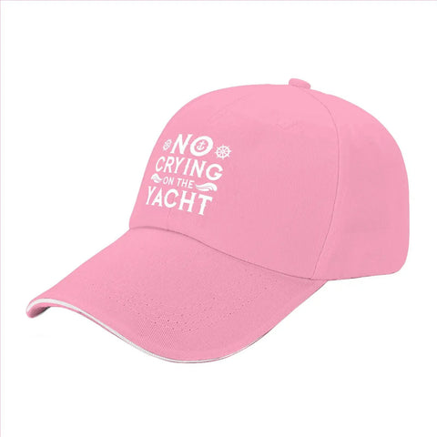 Pink Breathable Cap With Six Vent Eyelets Low Profile Unstructured Hat For Women And Men Athletic Style Casual Everyday Wear Pair It With Jeans Sneakers And A Bomber Jacket, showing a front view with text 'No Crying On The Yacht'.