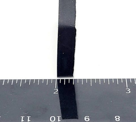 Side view of Rectangle Silicone Rubber Bumper Feet One And One Half Inch By One Inch Three Sixteenth Inch Thick with ruler for size reference