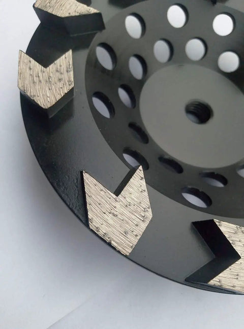 Close-up of Beast 7 Inch Diamond Grinding Cup Wheel With Arrow Segments Grit 30 35 For Concrete Epoxy Glue Paint Mastic Coating Removal Five Eighths By Eleven Thread Long Lasting Performance