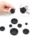 Hand holding a rubber grommet from a 200 Piece Rubber Grommet Set With 7 Sizes For DIY Wiring Electrical And Plumbing Projects, Closed Hole Plugs M7.14 M9.53 M12, Heavy Duty Durable Insulated Flame Retardant Dustproof, Anti Aging And Flexible For Wires And Hoses. Additional grommets are displayed on a white background.