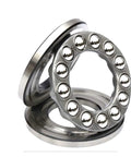 Angled front view of two 10x24x9 mm steel thrust ball bearings with visible chrome balls.