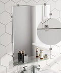 20 Piece Heavy Lifter Plastic Mirror Mounting Clips Kit With Premium Stainless Screws securing a bathroom mirror against a hexagonal tile wall.