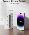Must Have Boss Level Compact Power Tower Surge Protector with USB ports next to smartphone, showing space-saving design, 6.29x2.95x2.95 in.
