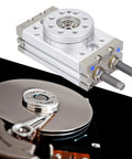 180 Degrees rotary pneumatic air cylinder, aluminum alloy, 18mm bore, adjustable angle; shown beside two HDD platters