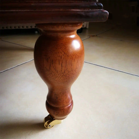 Hella Smooth 360 Swivel Brass Caster Wheels With Slick Vintage Style Built Tough For Heavy Duty Furniture Rollers Simple Bolt Attach Design Handles Two Hundred Kilos Like A Total Champ Daily visible on wooden table leg