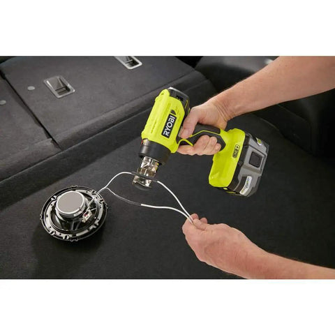 18V Cordless Heat Gun For Quick Heating Tasks Like Shrink Tubing And Paint Removal Up To 875 Degrees Fahrenheit With A Fast Under Ten Seconds Heat Up DIY Friendly Tool Only being used on speaker wires.