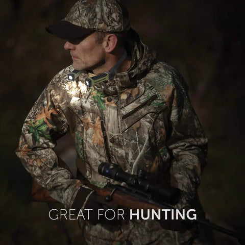 Man wearing camouflage holding a rifle with Hands Free Neck Light For Camping Hunting And Work, rugged design illuminated in forest.