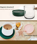 Electric Cup Warmer With Auto Shut Off Timer And Dual Temp Control Keeps Your Morning Brew Cozy On Your Desk With A Bright LED Display placed on a table with a coffee cup.