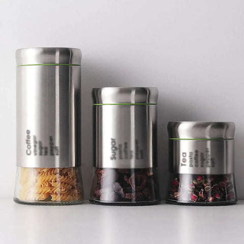 600 Milliliter Airtight Glass Coffee Storage Jar With Stainless Steel Lid Locks In Aroma For Beans Grounds Tea And Nuts Keeping Your Kitchen Stash Crisp And Secure While Boosting Your Daily Home Setup Game, displayed with pasta, sugar, and tea.