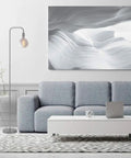 Holden 70 Inch Floor Lamp in Brushed Steel with Inline On Off Foot Switch beside modern grey sofa in living room