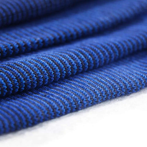 Close-up of blue knitted fabric detail for the Kids Compression Ankle Sleeve For Sprains And Tendonitis Knitted Ankle Brace, 1 Pair.
