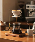 Adjustable Pour Over Coffee Stand, Sleek Wood And Aluminum Dripper Holder For Standard Mugs And Large Carafes, Hands Free Kitchen Counter Brewing Rack For Smooth Daily Sips And No Mess Grinds in home kitchen setting.
