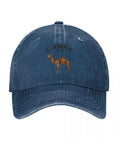Front view of blue camel embroidered trucker hat