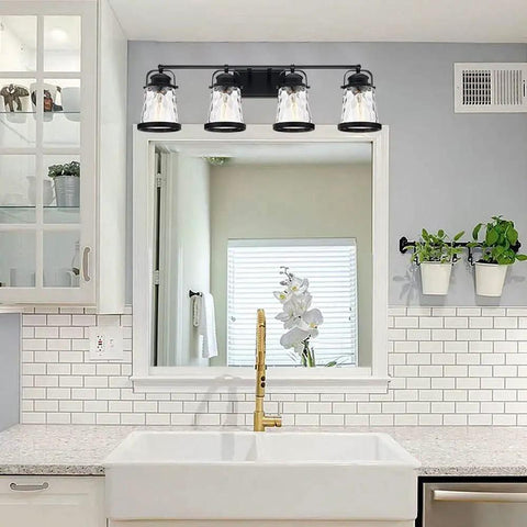 Four Light Farmhouse Vanity Lights With Rustic Wall Sconces And Hammered Glass Shades over bathroom mirror.