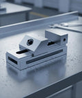 WeiLaiKeQi Precision Swivel Vise For Milling Machinists Heavy Duty Alloy Steel Toolmaker Clamp on a workbench with metal shavings.