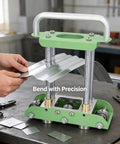 Two Station Sheet Metal Bender For Manual Bending Of Steel Aluminum And Copper From 0 To 90 Degrees in use on workbench