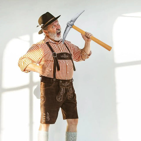 Dope Realistic 49 Cm Fake Pickaxe Prop For Halloween Cosplay And Masquerade Party Decor held by a man in traditional attire