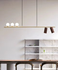 Top Shelf Real Walnut Ceiling Pendant Light, Sleek Chinese Modern Dining Room Chandelier over dining table with glowing globes.