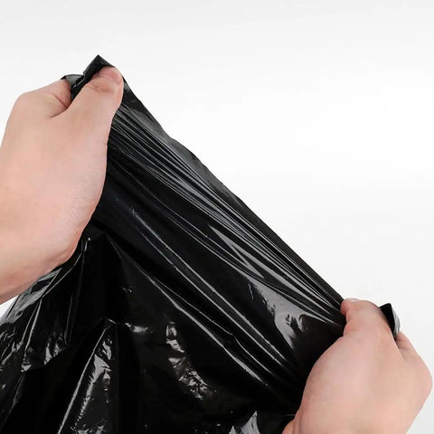 Hands holding black Espresso Knock Box Garbage Bags 13x35 Inches 100 Pack Heavy Duty Thick Liners for commercial use