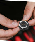 Close-up of Dope Push Button Hood Pin Latch Kit For Cars showing push-button mechanism in hand, racing style black latch.