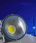 Heavy Duty Portable Floodlight With A Rock Solid Aluminum Build And Hella Bright LED Spotlight For Outdoor Job Sites And Backyard Chores Rechargeable Work Lamp That Always Gets The Job Done, showing the bright LED spotlight design.