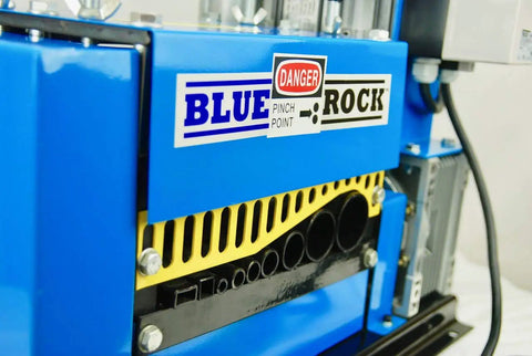 Close-up of blue WS 212 Wire Stripping Machine with nine cutting channels and auto feed system.