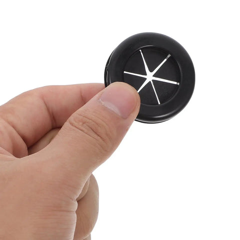 4 Pack Black Rubber Grommet Kit With Dual Sided Buckle Design Waterproof Desk Hole Cover For Cable Protection And Fixation Adjustable Rubber Cable Grommets For Office To Keep Cables Neat And Tidy With No Fuss. black rubber desk hole cover with dual-sided buckle, held in hand