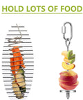 Fruit holder display with sliced fruit on metal skewer, showcasing design for attracting butterflies, sturdy weather resistant stand.