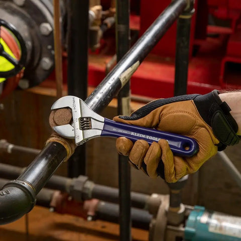 Worker using Extra Wide Jaw Adjustable Wrench 8 Inch Forged Drive Tool With High Polish Chrome Finish Built For Tight Spaces.