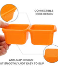 Close-up of 42 Pack Tool Box Organizer With Interlocking Tool Tray Dividers showing connectable orange trays for tool storage.