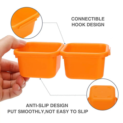 Close-up of 42 Pack Tool Box Organizer With Interlocking Tool Tray Dividers showing connectable orange trays for tool storage.