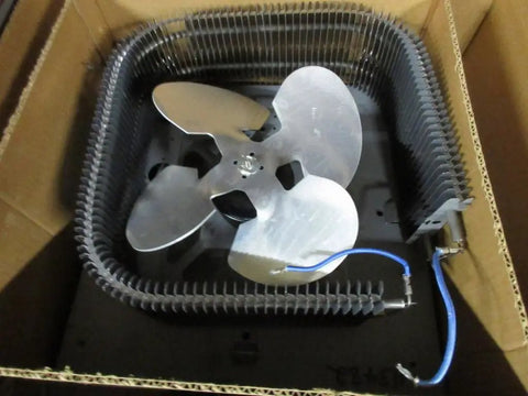 Heavy Duty Kick Butt Air Heater 240 Volt 2000 Watt Delivers 6826 Btu inside a cardboard box with wires and metal fan.