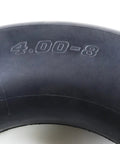 Close-up of 4.80/4.00-8 Inner Tube With Bent Valve Stem for Lawn Mowers, Wheelbarrows, Tractors, and Snow Blowers