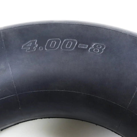 Close-up of 4.80/4.00-8 Inner Tube With Bent Valve Stem for Lawn Mowers, Wheelbarrows, Tractors, and Snow Blowers