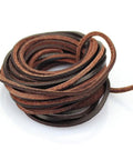 Real Deal 3mm Flat Genuine Leather Braiding String In Dark Espresso Brown Five Yards Long shown in a coiled roll.