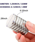 Hand holding six pack super strong neodymium disc magnets with double sided adhesive for fridge DIY projects craft office and scientific use heavy duty rare earth magnets 1.26 inch diameter by 1/8 inch thick