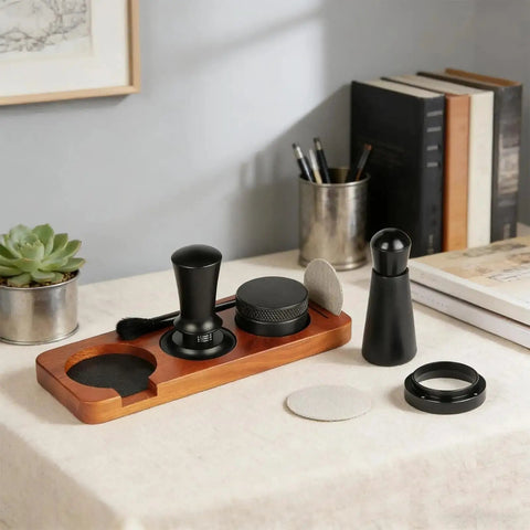 Crank Out Shop Quality Espresso Shots With This Premium 51Mm Tamper Set Including Seven Essential Tools A Smart Distribution Wand And Soft Counter Pad For Home Brewers on a kitchen table.