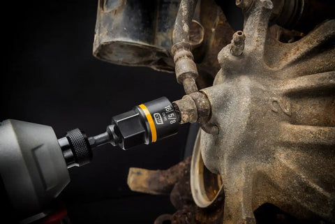 Fifteen Piece One Quarter Inch And Three Eighth Inch Drive Bolt Biter Impact Extraction Socket Set for damaged fasteners in use.