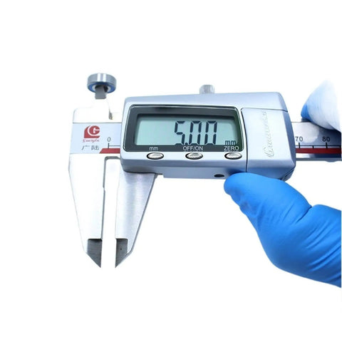 Digital caliper measuring 5x12x4 mm ABEC-3 Precision Ball Bearings for RC Cars and Trucks, 10 Pack, showing 5.00 mm sizing.