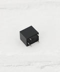 Five Pack SRA-05VDC-CL Mini Power Relays With 5V DC Coils SPDT Contacts, compact PCB mount, shown in black casing.
