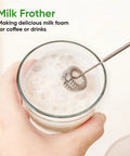 Milk frother attachment in use on glass of milk, part of Powerful 1100W Immersion Hand Blender 3 In 1 Corded Stick